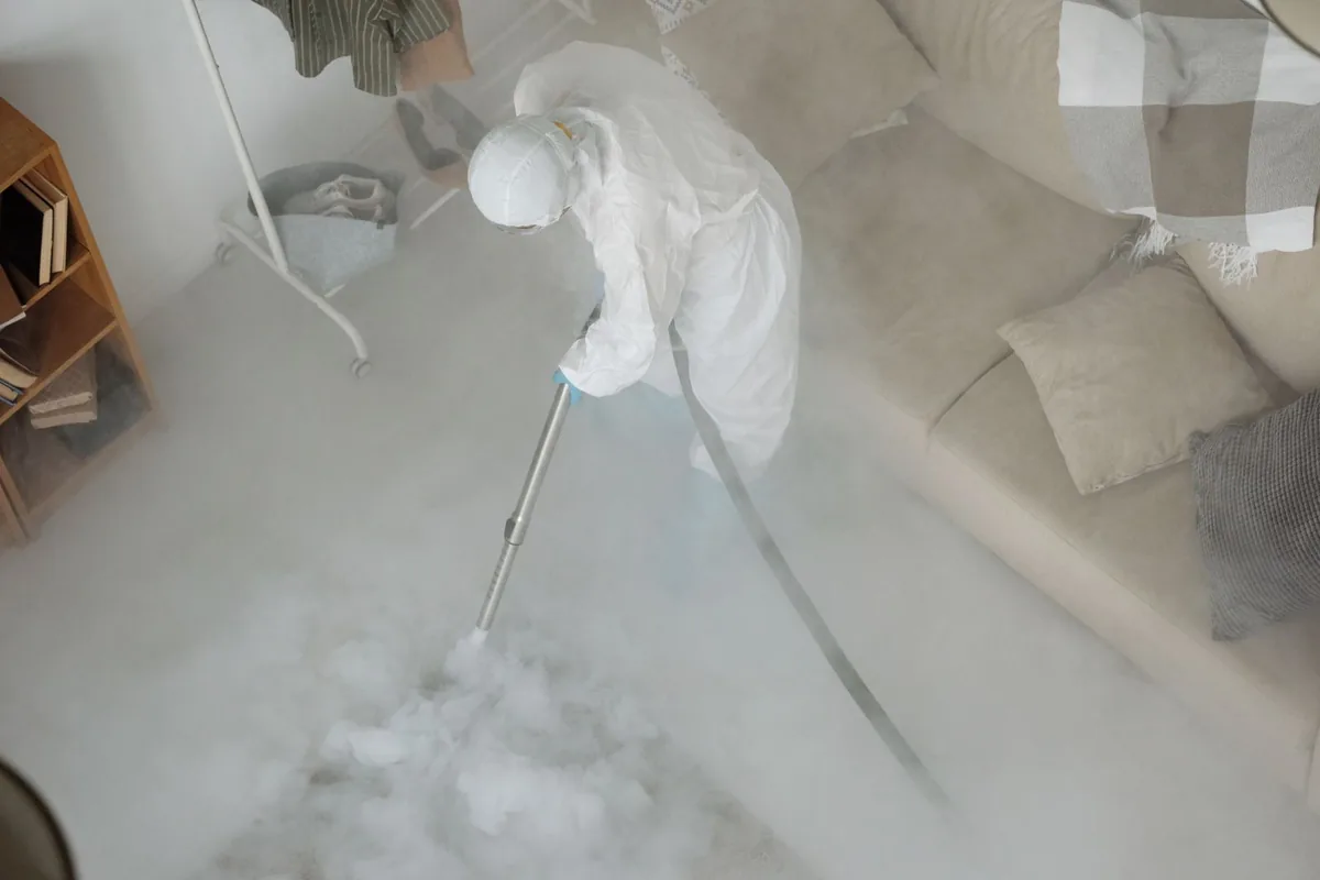 Biohazard cleanup technician in protective equipment, Lancaster, SC